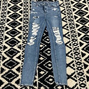 Next level stretch by American Eagle. No stains, barely worn.